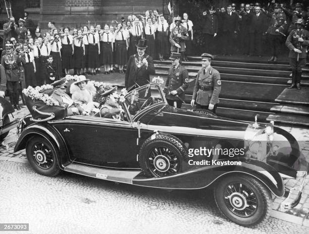 German field marshal and Nazi leader Hermann Goering and his second wife, actress Emmy Sonnemann , leaving Berlin Cathedral in a Mercedes 540K, after...