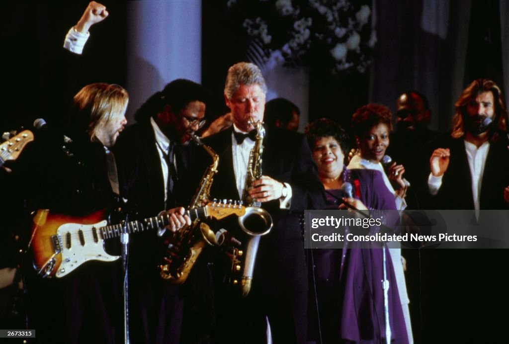 Bill Clinton Playing Rugby American statesman Bill Clinton playing the saxophone in a band at ...