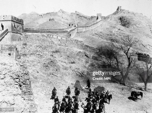 Cavalrymen in front of the Great Wall of China during the Boxer rebellion.