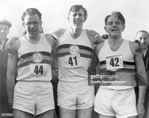 Roger Bannister with Chris Chataway and Chris Brasher after Bannister broke the mile world record with a time of 3 minutes and 59.4 seconds. The...