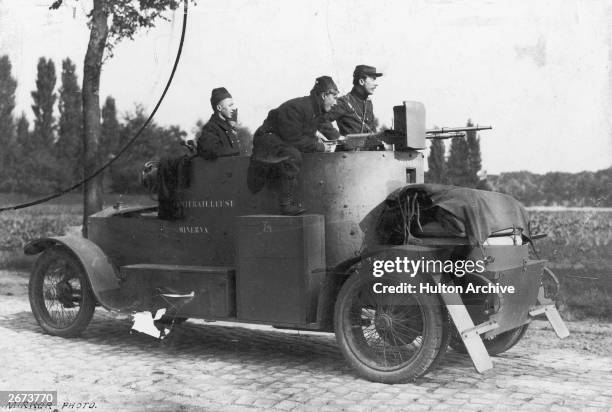 Belgian soldiers driving a Minerva armoured car during the First World War.