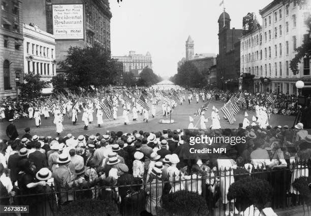 At the height of their power 000 members of the American white supremacist movement, the Ku Klux Klan parade down Pennsylvania Avenue in Washington...