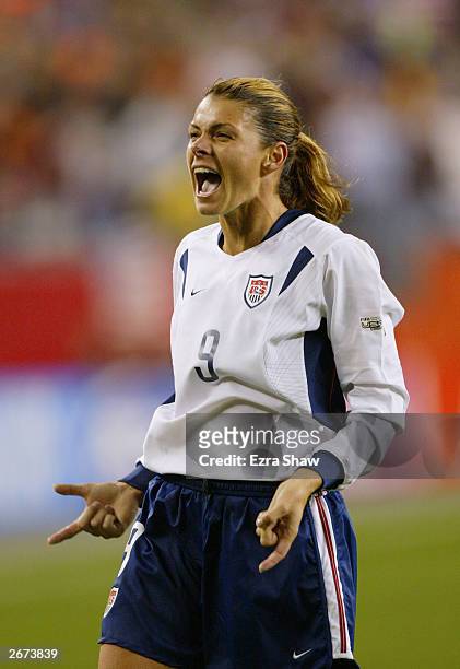Mia Hamm of the United States celebrates after they beat Norway 1-0 in their FIFA Women's World Cup quarterfinal match at Gillette Stadium on October...