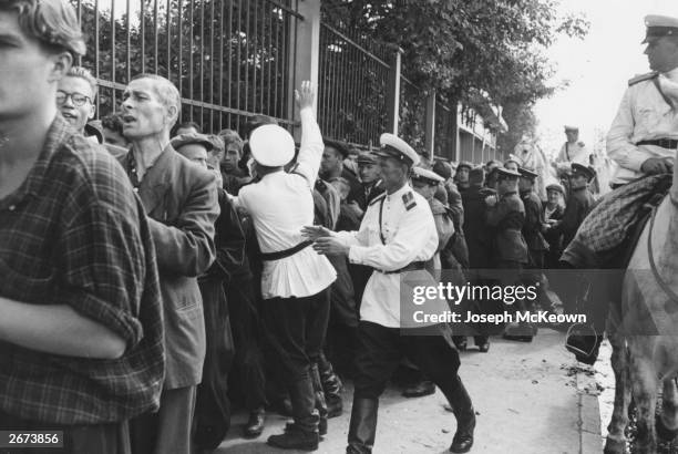 Russian police and militia manhandle the crowds before the match as Wolverhampton Wanderers play Spartak Moscow in Moscow. Original Publication:...