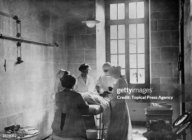 British nurses at an operation in France during World War I.