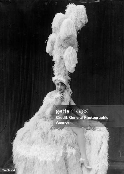 Mistinguett, singer and dancer Jeanne-Marie Bourgeois , at the Folies Bergere cabaret theatre in Paris.