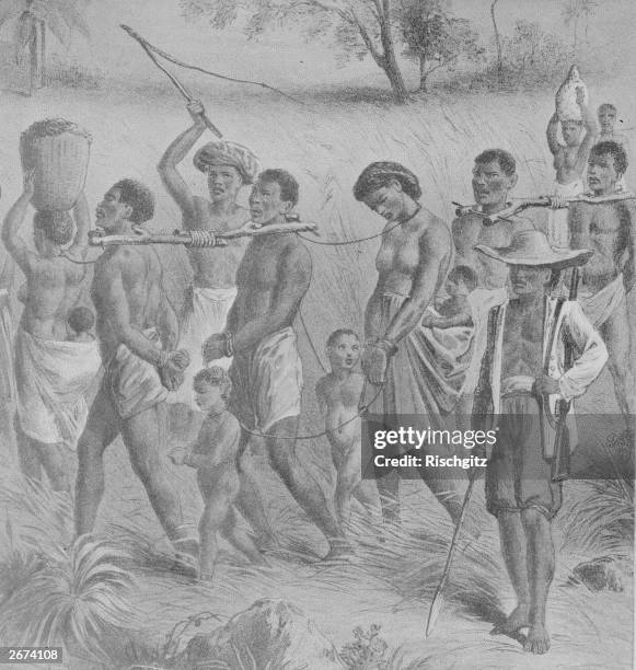 Shackled Africans being taken into slavery, circa 1700.