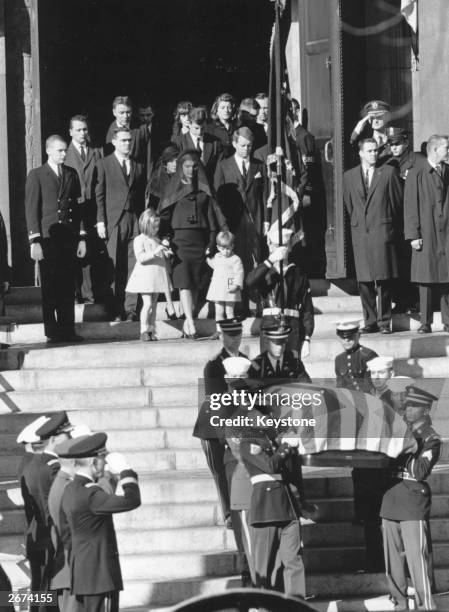 The coffin of assassinated American President John F. Kennedy is carried down the steps at St Matthew's Cathedral, Washington, after the requiem...