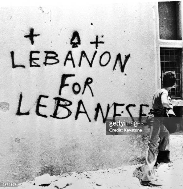 Graffiti reading 'Lebanon For Lebanese' on a wall in Lebanon during the civil war there.