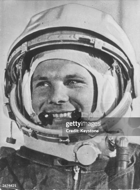 Soviet cosmonaut Yuri Gagarin wearing his helmet for the first ever manned flight in space.