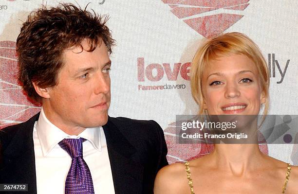 British actor Hugh Grant and actress Heike Makatsch arrive at the premiere of his new movie "Love Actually" directed by Richard Curtis October 28,...