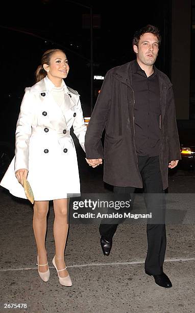 Ben Affleck and Jennifer Lopez leave a Soho restaurant October 28, 2003 in New York City.