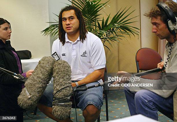 Australian flanker George Smith talks to journalists during a media session in Melbourne, 28 October 2003. Australia will meet Ireland in their Rugby...