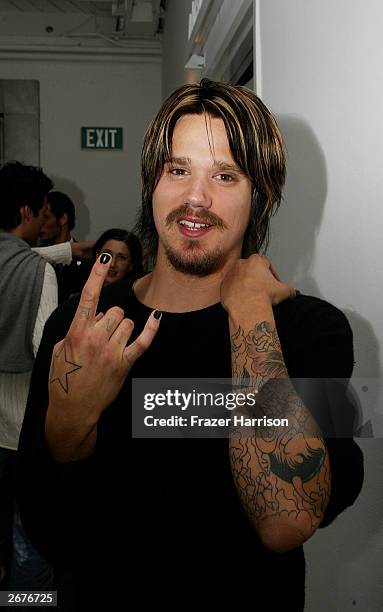 Sean Stewart son of musician Rod Stewart shows off his new tattoos at the Jennifer Nicholson fashion show held as part of the 2003 Smashbox Fashion...