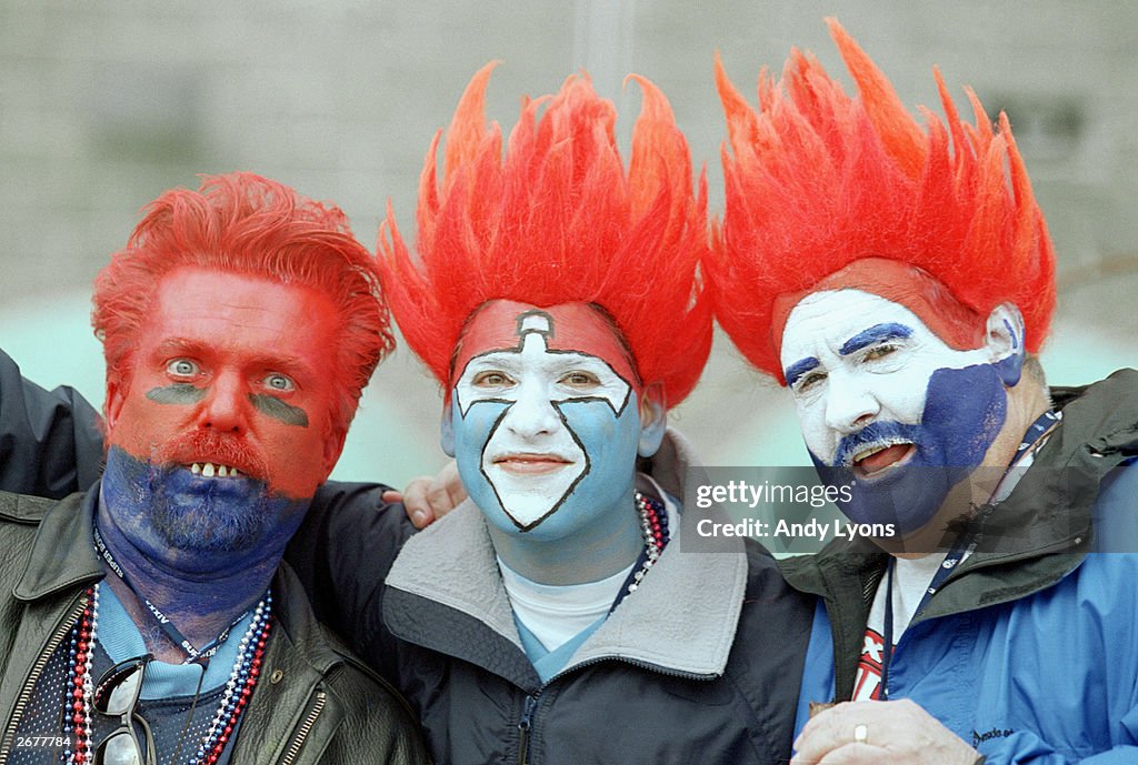 Titans fans pose for a photograph
