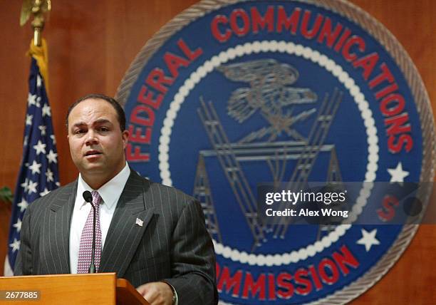 Federal Communications Commission Chairman Michael Powell speaks during a meeting at the commission's headquarters October 29, 2003 in Washington,...