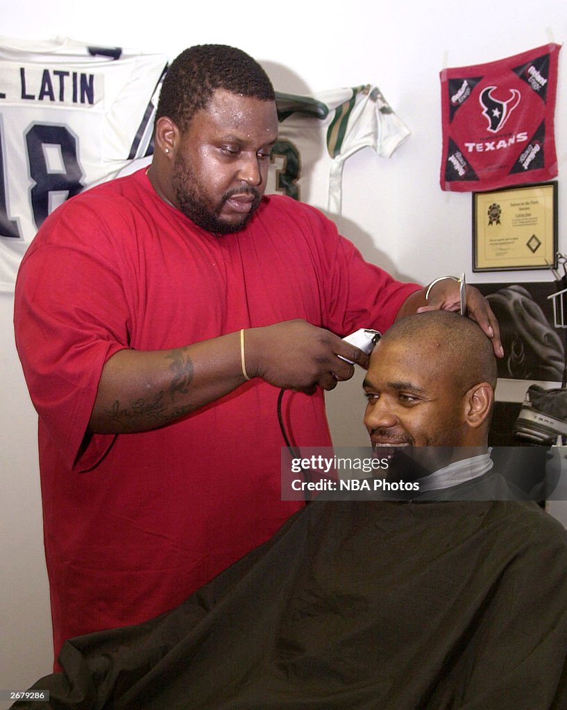 Moochie Norris Gets Hair Cut
