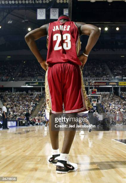 Lebron James of the Cleveland Cavaliers waits for the ball against the Sacramento Kings during an NBA game at Arco Arena on October 29, 2003 in...