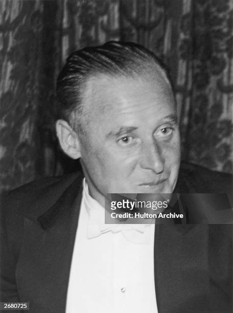 British aircraft designer R J Mitchell at a Scneider Cup dinner at the Southwestern Hotel, Southampton. Mitchell was responsible for the design of...