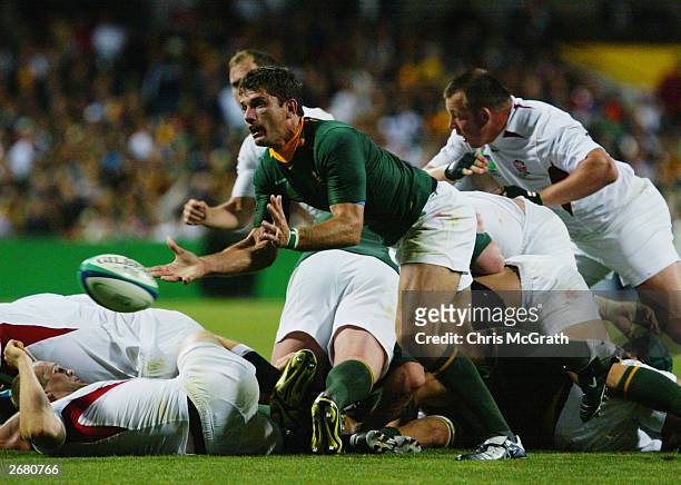 Joost van der Westhuizen of South Africa offloads the ball during the Rugby World Cup Pool C match between South Africa and England on October 18,...