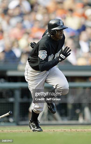 Outfielder Juan Pierre of the Florida Marlins runs against the San Francisco Giants during the fourth inning of Game 2 of the 2003 National League...