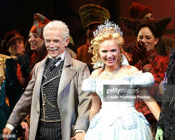 Actor Joel Grey and actress Kristin Chenoweth perform on stage during the opening night performance of the Broadway musical "Wicked" at The Gershwin...