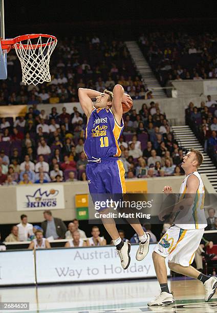 Jason Smith of the Kings slam dunks during the round 5 NBL match between the Sydney Kings and the Townsville Crocodiles held at the Sydney...