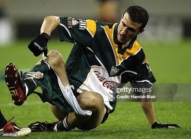 Joe Burgin for Ireland loses his shorts in a tackle from Chris Johnson for Australia during the second match of the International Rules series...