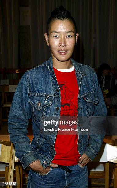 Jenny Shimizu watches models walk down the runway at the Alicia Lawhon fashion show during the Mercedes-Benz Shows LA Spring 2004 Collections at The...