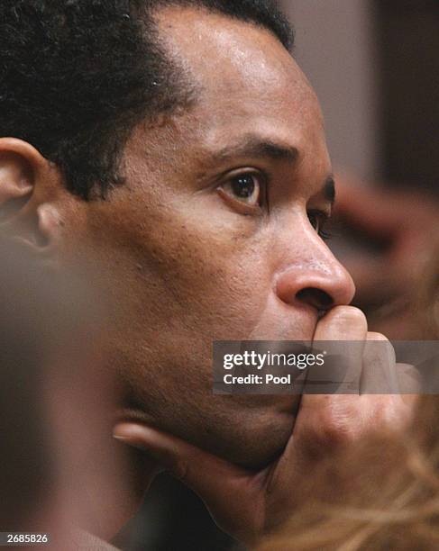Sniper suspect John Allen Muhammad listens to testimony during his trial during the trial of Washington area sniper suspect John Allen Muhammad in...