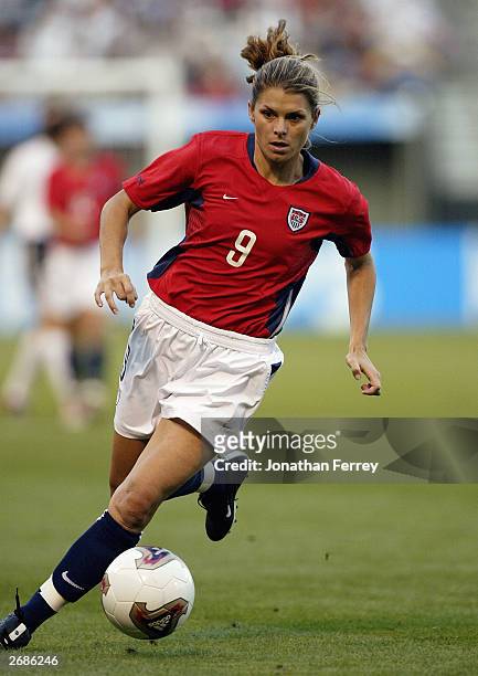 Mia Hamm of the USA advances the ball against Germany during the semifinals of the FIFA Women's World Cup match on October 5, 2003 at PGE Park in...