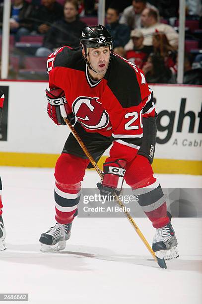 Left wing Jay Pandolfo of the New Jersey Devils keeps his stick down on the ice against the Florida Panthers on October 22, 2003 at the Continental...