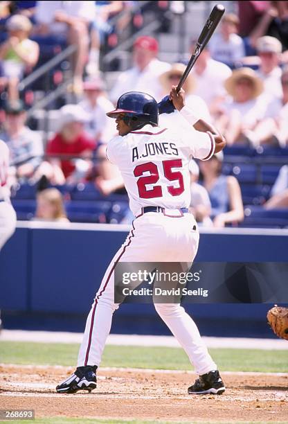 Outfielder Andruw Jones of the Atlanta Braves in action during a spring training game against the Boston Red Sox at Turner Field in Atlanta, Georgia....