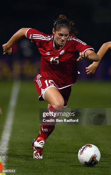 Kara Lang of Canada runs moves the ball against Sweden during the semifinals of the FIFA Women's World Cup match on October 5, 2003 at PGE Park in...