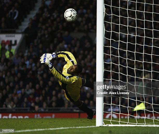 Goalkeeper Shaka Hislop of Portsmouth dives as Cristiano Ronaldo of Man Utd scores the second goal with a free kick during the FA Barclaycard...