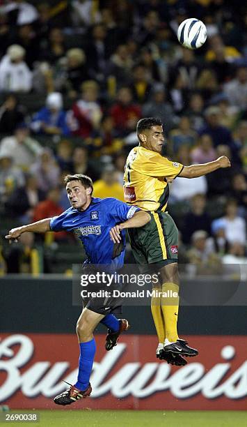 Arturo Torres of the Los Angeles Galaxy out jumps Todd Dunivant of the San Jose Earthquakes during the 2nd half of the MLS Western Conference...