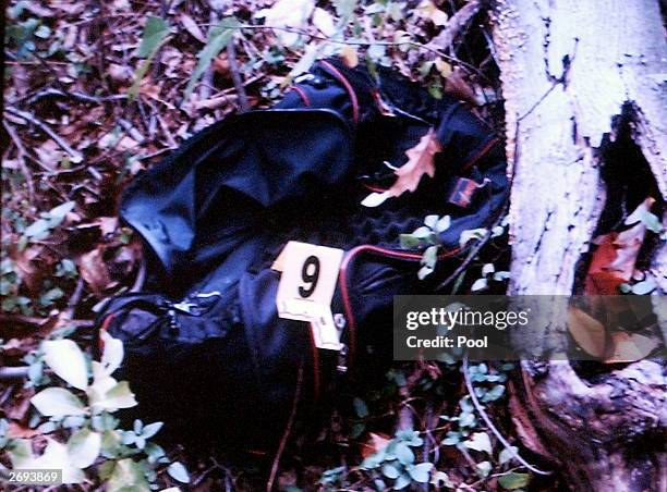 Photo of a duffle bag found near the shooting scene of Maryland bus driver Conrad Johnson, is shown on a screen November 3, 2003 during the trial of...