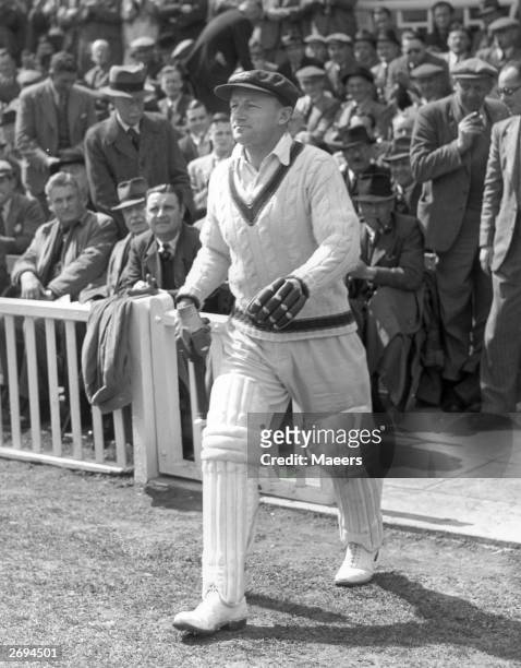 Captain of the Australian cricket team Don Bradman on his last tour, going in to bat at Worcester, England. He averaged very nearly 100 runs...