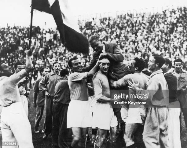 The Italian World Cup squad carry their manager, Vittorio Pozzo , shoulder high following their 2-1 victory over Czechoslovakia after extra time in...