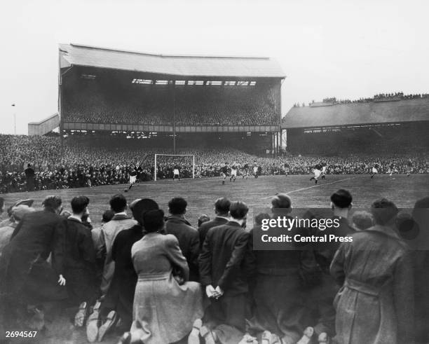 Crowd of around 82,000 watching Chelsea play Moscow Dynamo at Stamford Bridge in the first game of the Russians' tour of Britain.