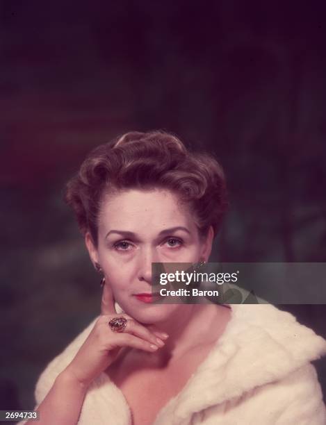 German soprano Elizabeth Schwarzkopf wearing a fur coat.