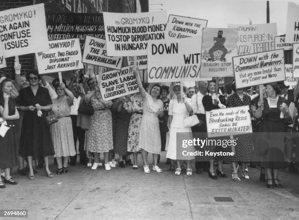 On the arrival of Soviet Foreign Minister Andrei Gromyko in New York, a group of women protest against the Soviet regime. A typical banner reads,...
