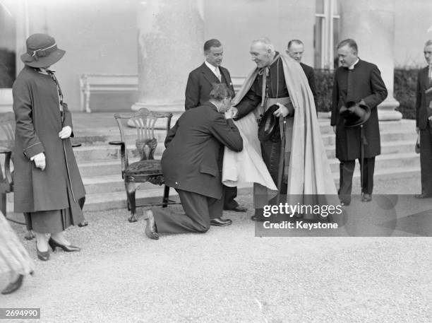 Irish President Eamon de Valera receiving the Archbishop of Dublin during the State Garden Party for the delegates of the World Education Conference...