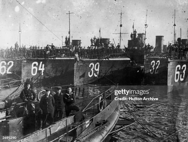 Men and ships of the German Torpedo Flotilla in the Kiel Canal in Germany.