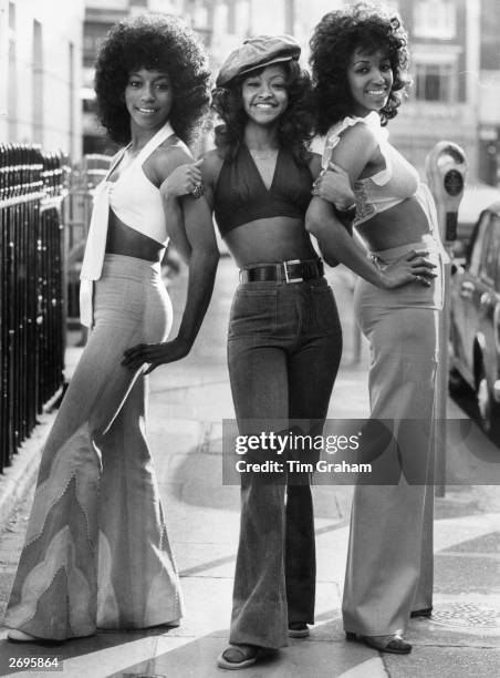 The Three Degrees , a American female singing group pictured in a London street.