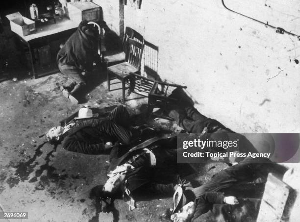 The dead bodies of gangsters from George 'Bugs' Moran's gang, murdered at the garage at 2122 North Clark, Chicago, by Al Capone's gang,led by...