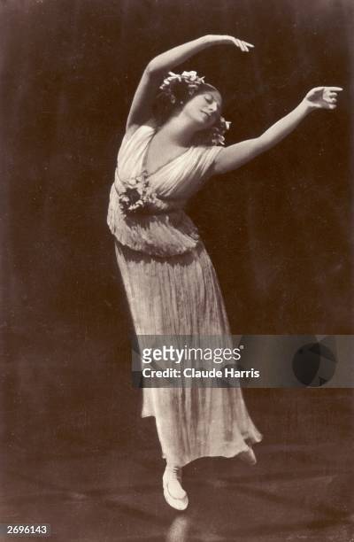 Russian Ballet dancer Anna Pavlova , regarded as the prima ballerina of her era, wearing a pleated dress without a corset for complete freedom of...