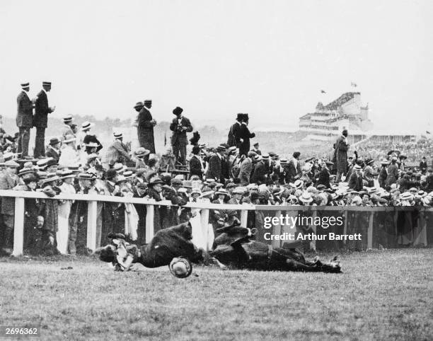 Emily Davison is fatally injured as she tries to stop the King's horse 'Amner' on Derby Day, to draw attention to the Women's Suffragette movement.