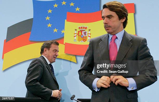 Spanish Prime Minister Jose Maria Aznar and German Chancellor Gerhard Schroeder leave a news conference on November 4, 2003 in Berlin, Germany. Aznar...