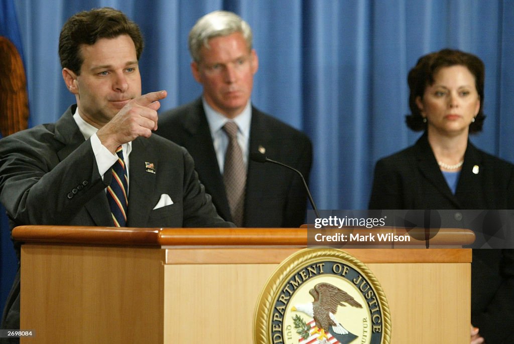 Assistant U.S. Attorney General Christopher Wray announces indictment